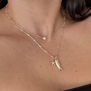 Noir NYC pacific Sun charm pendant necklace